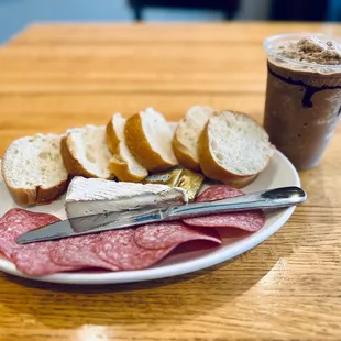 Baguette plate with salami and Brie, Kona blended coffee with espresso shot