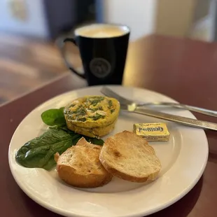Veggie quiche (beware really small but perfect when you just need something tiny) and a pistachio latte
