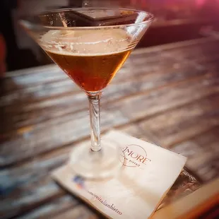 a martini on a table