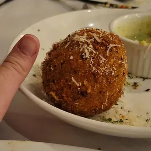Fried cheese ball appetizer- my finger for size.