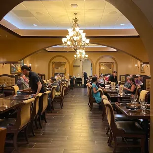 a dining room with a chandelier