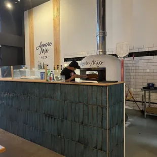 a man working behind the counter