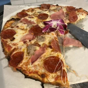 a slice missing from the pizza