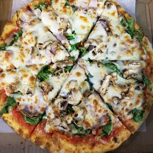 The Florentine Pizza... Ham, spinach, mushrooms, sauce and cheese.