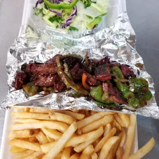 Steak tips and pepper dinner plate... with fries and side salad