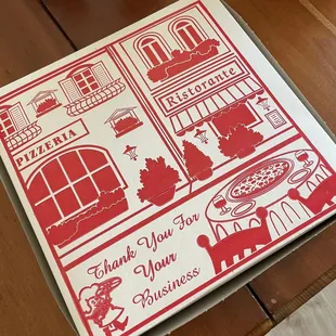 a pizza box on a table