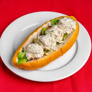 Tuna sandwich with onion, tomato and lettuce