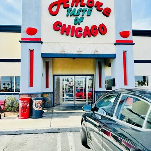 a car parked in front of a restaurant