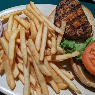 A Blackened Mahi Tuna Sandwich with French Fries