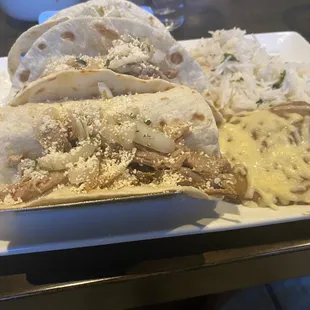 Carnitas Tacos with white rice....at a Mexican restaurant