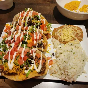 Barbacoa tacos with rice and beans