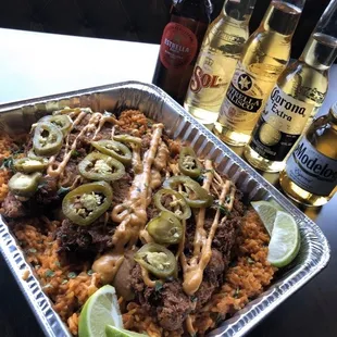 chicken Breast battered smothered with Mexican spices. All the this along side our Pork belly refried Beans and Mexican Rice