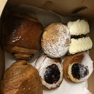 Carrot cake, berry danishes and chocolate croissants.