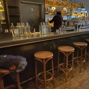 a man standing at a bar