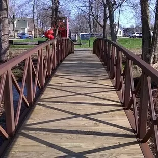 one of two bridges spanning Pleasant Creek.  The west one leads to the firehouse playground