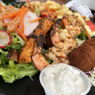 Skewer Duo- Garlic Pepper Shrimp and Alaskan Salmon, sub rice for more salad and a side of falafel