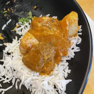 a plate of food with rice