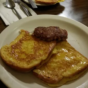 a plate of french toast and sausage