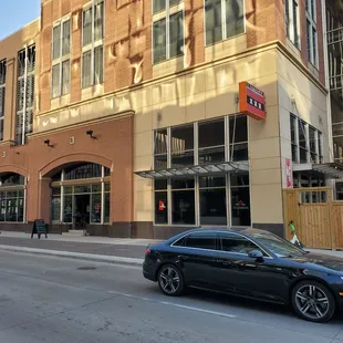a car parked in front of a building