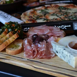a variety of food on a cutting board