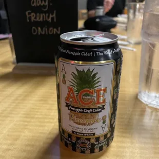 a can of beer on a table