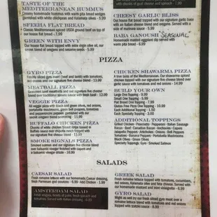 Smoke Signals Pizza on the Amsterdam Deli menu, unavailable at their Main Street location.
