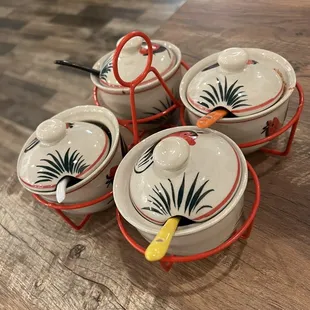 a set of four ceramic dishes