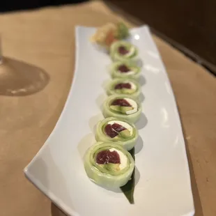 a plate of appetizers on a table