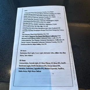 a menu on a glass table