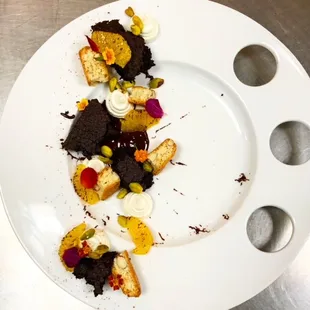 a plate of desserts on a table