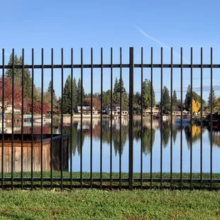 I love the reflections of homes on the lake.