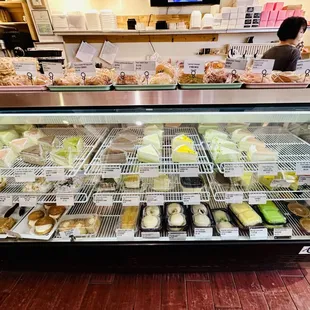Display case of breads, cakes, etc.