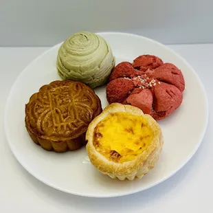 Long jin tea pastry, pineapple moon cake, lychee rose pastry, egg tart