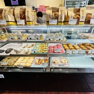 Display case of breads, pastries, etc.
