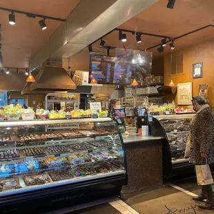 a woman standing in front of the counter