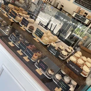 The beautiful display of cupcakes inside the store!