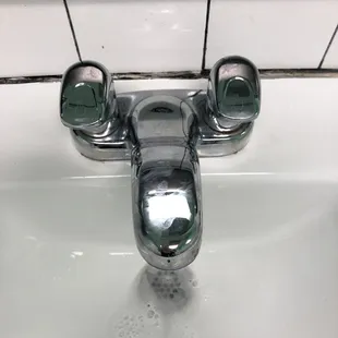 Bathroom sink with little push pedals