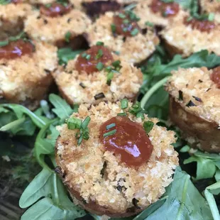 Mini crab cakes with spiced cocktail sauce