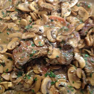 Amy's Moveable Feast Pork Chop smothered in Mushroom Marsala Sauce