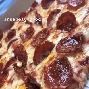 Pepperoni Pizza - insanely good pizza and attentive service. Only waited 15 min for 2 subs an order of breadsticks and a large pie.