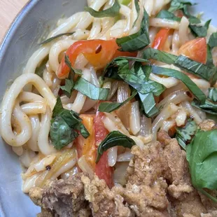 Creamy curry udon - Coconut based red curry sauce with bell peppers and udon noodles.