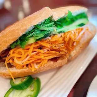40 ( Beef Sandwish)banh Mi Bo $11.00 /good but very salty. It will be better if they dial back on the salty marinade on the beef.