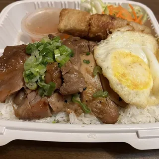 23. ( Grilled Chicken Combo Over Rice)Com Ga, Cha Gio, and Trung