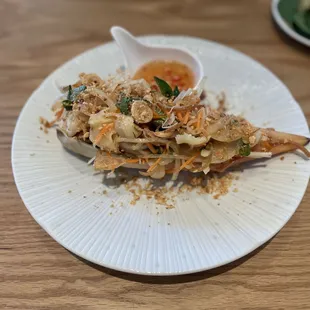 Conch salad inside a banana blossom petal