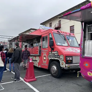 a food truck parked in a parking lot