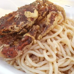 Soft shell crab over garlic noodles