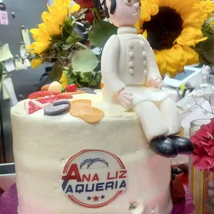 Celebritory cake that someone stuck a finger in!