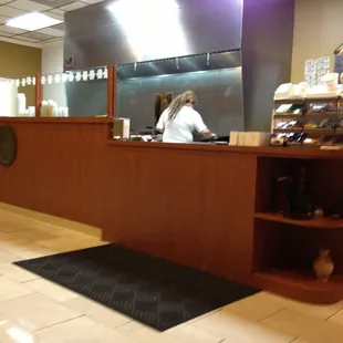 Counter &amp; grill. Mostly a takeout place but there are 3 small tables that can seat 4 each.