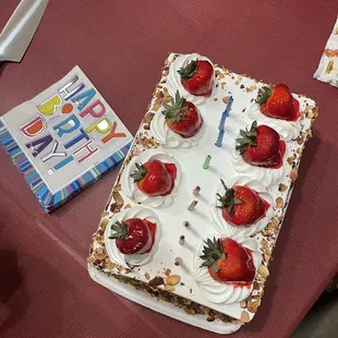 a cake with strawberries on it