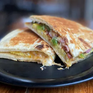 a plate with a sandwich cut in half